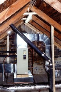 Colour photo of new furnace installed in one of the three attics at Horaceville, Pinhey's Point, during the 1995–1996 house restoration