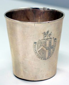 This is a colour photo of a sterling silver beaker made by London silversmith John Kentish for Sir James Monk, and engraved with the arms of Monk empaling those of his wife Elizabeth Adams of London (PPF Collections, provenance Charles G. Monk)