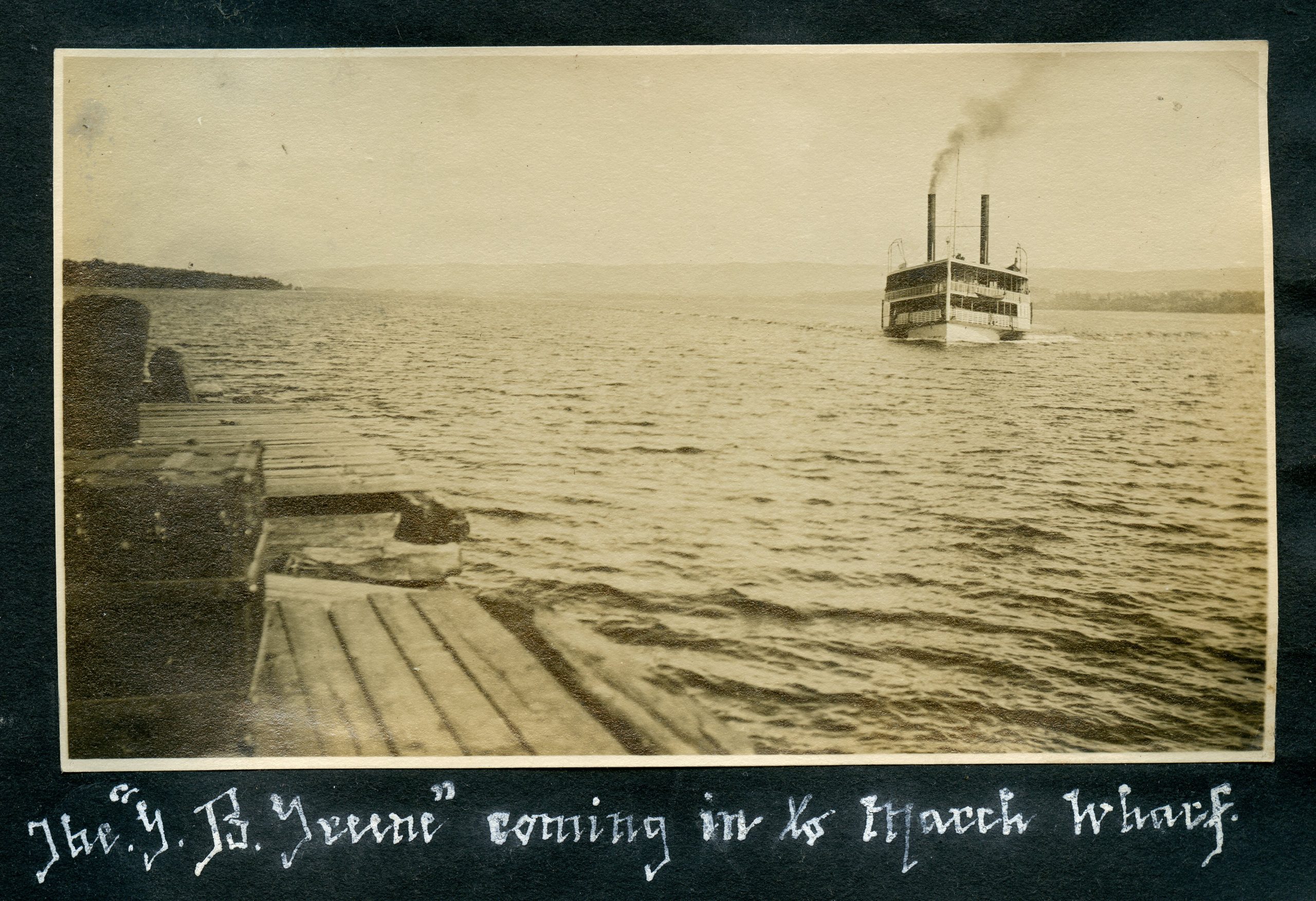 A 1913 black-and-white photo of the steamboat G.B. Greene pasted into an album belonging to May (Monk) Berry. (PPF Collections, Gift of Bill Berry?)